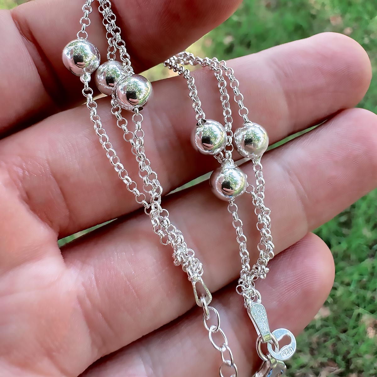 Pulsera de Tres Hilos y Bolas de Plata de Ley